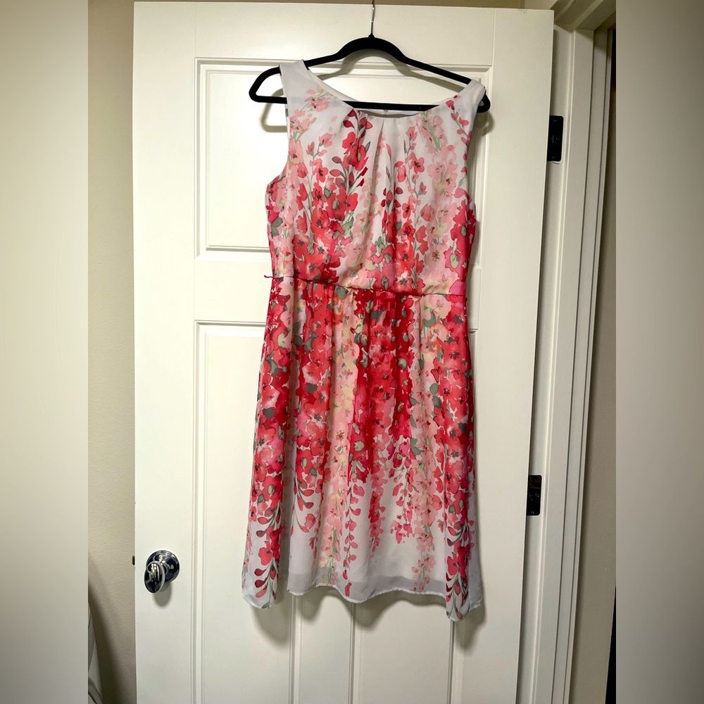 Knee length white dress with orange leaves
